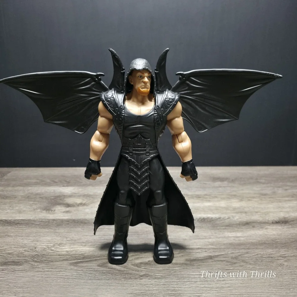 2014 Mattel WWE The Undertaker with Pop Up Black Wings 12